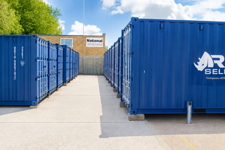 Blue storage containers either side of the drive-up aisle at Rhino Storage Salisbury
